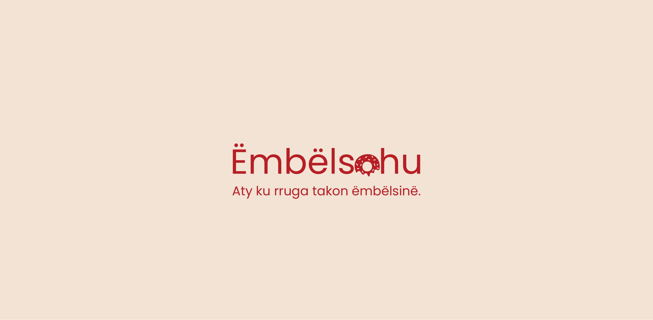 The Embëlsohu logo and motto on a warm pink background