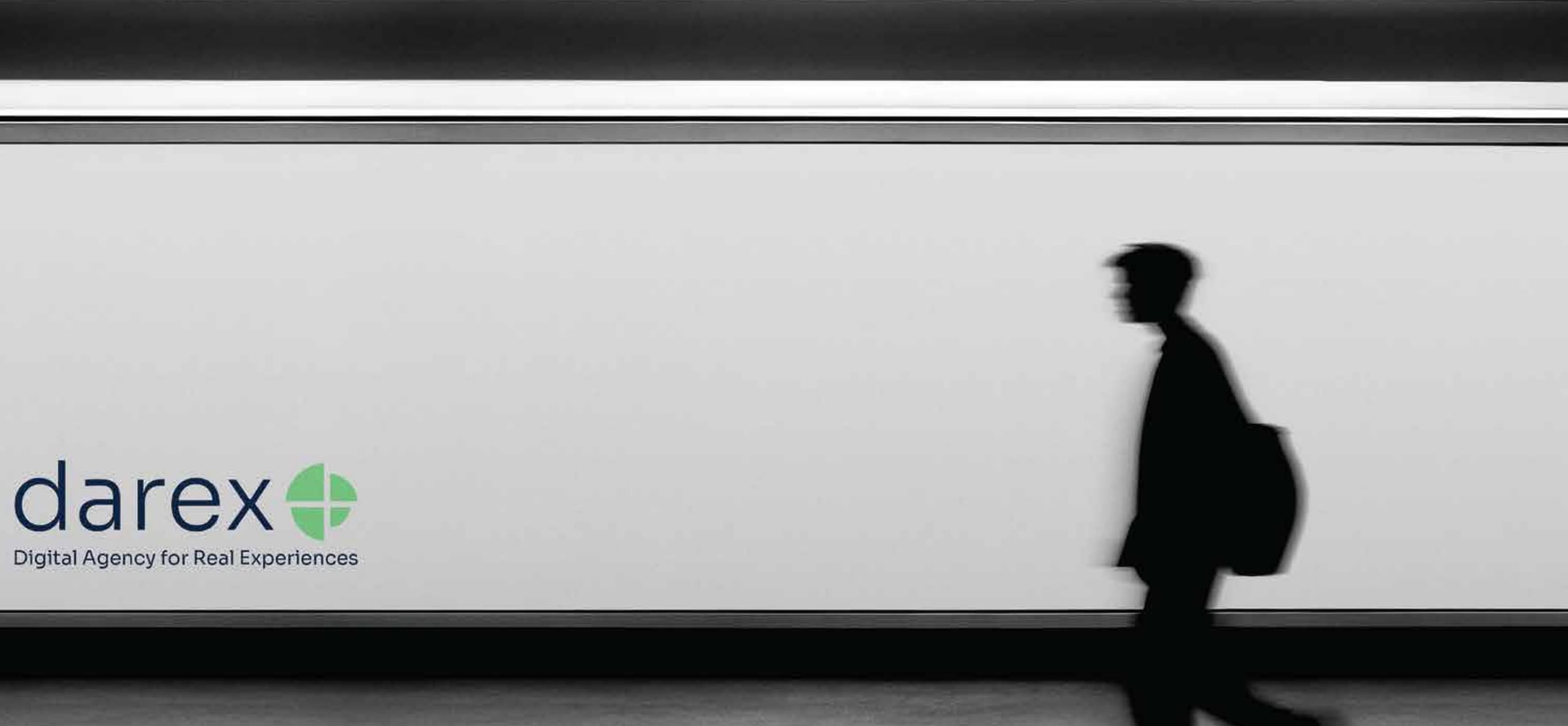 darex billboard with a pedestrian silhouette